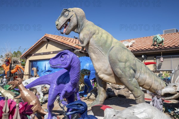 Henderson, Nevada - Dinosaurs dominate the yard of a house in suburban Las Vegas, placed there by retired school teacher Steve Springer