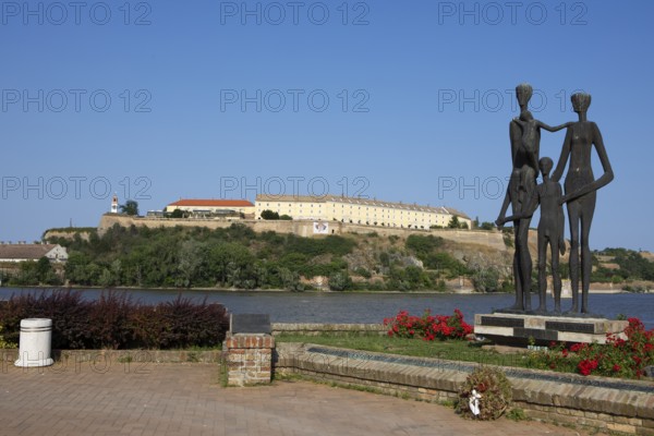 Memorial to the victims of the Novi Sad massacre, in the back the Petrovaradin Fortress or Petrovaradin on the Danube, Novi Sad, Vojvodina Province, Serbia
