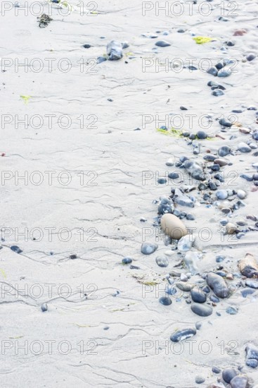 Pattern in sand with scattered stones on a quiet sandy beach, drainage channels, runoff water, gutters, meanders, structure, natural structures, flint, flints, pebbles, beach stones, beach, mudflats at low tide, soft light, atmosphere, shore, detail, close-up, nobody, maritime, deserted, sea, south beach, North Sea, Dune island, Heligoland, Pinneberg District, Schleswig-Holstein, Germany