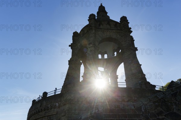 Kaiser Wilhelm Memorial, national monument with dome, landmark, sunny autumn weather, back light, sun rays, Porta Westfalica, Ostwestfalen-Lippe, East Westphalia, North Rhine-Westphalia, Germany