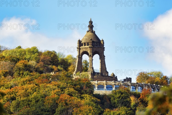 Kaiser Wilhelm Memorial, national monument with dome, landmark, restaurant on viewing platform, autumn forest, sunny autumn weather, Wittekindsberg, Porta Westfalica, Ostwestfalen-Lippe, East Westphalia, North Rhine-Westphalia, Germany