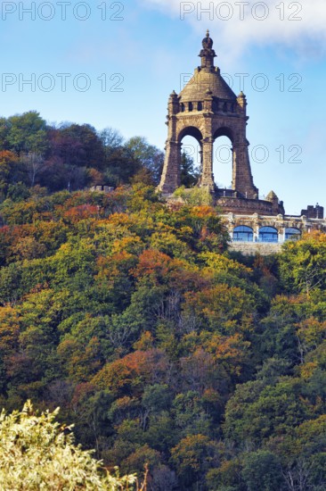 Kaiser Wilhelm Memorial, national monument with dome, landmark, restaurant on viewing platform, autumn forest, sunny autumn weather, Wittekindsberg, Porta Westfalica, Ostwestfalen-Lippe, East Westphalia, North Rhine-Westphalia, Germany