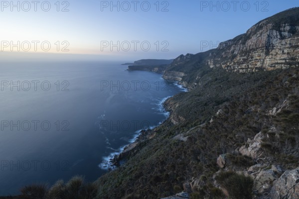 Shipstern Bluff viewpoint. Blue hour with long exposure showing sunset over the cliffs of Cape Raoul, Tasman Peninsula, Tasmania, Australia