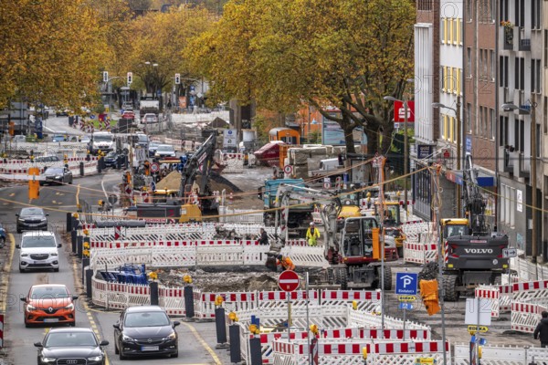Large-scale construction site on Alleestrasse in downtown Bochum, road construction, construction of new cycle lanes, sidewalks, road surfaces, renewal of canals and water collection systems, trenches, for rainwater, greening, sustainable and modern road conversion, North Rhine-Westphalia, Germany