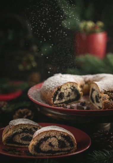 Icing sugar falls on poppy seed cake on red plate surrounded by Christmas decorations