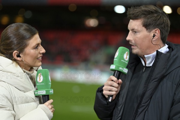 SKY presenter Mara Mones interviewed microphone micro logo with trainer coach Merlin Polzin Hamburger SV HSV portrait DFB-Pokal, Voith-Arena, Heidenheim, Baden-Württemberg, Germany