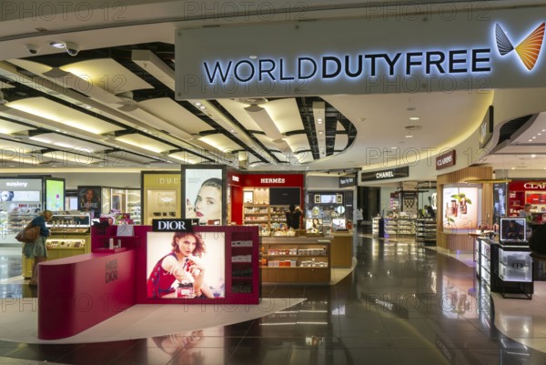 Perfume cosmetics brands on display Duty Free shopping area in departures lounge area, Terminal 5, London Heathrow airport, London, England, UK