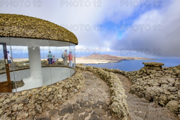 Panoramic window in a building designed by Cesar Manrique with the collaboration of Jesús Soto and architect Eduardo Caceres, without right angles corners at viewpoint tourist attraction El Mirador del Río on the summit of the 474 meter high Risco de Famara in the Famarama region with panoramic views of the Chinijo Archipelago, Lanzarote, Canary Islands, Canary Islands, Spain