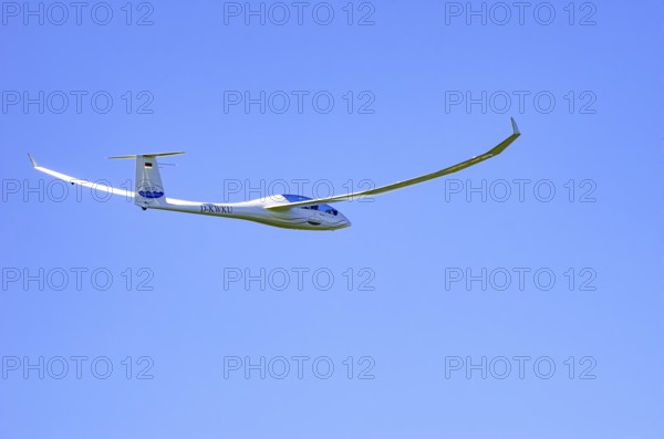 A Schempp-Hirth Arcus E motor glider, registration D-KWKU, during a screening as part of an air show at the Fliegerbergfest of the Rossfeld Luftsportverein in Metzingen-Glems, Baden-Württemberg, Germany, for editorial use only