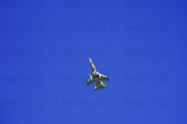 A single-jet fighter jet during a flight demonstration as part of an air show at the Rossfeld Air Sports Association in Metzingen-Glems, Baden-Württemberg, Germany, for editorial use only