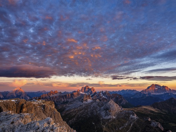 Alpenglühen, Rifugio Lagazuoi and rugged Dolomite peaks at sunset, Monte Pelmo in the middle, Civetta on the right, Dolomites, Alps, Belluno province, Veneto, Italy