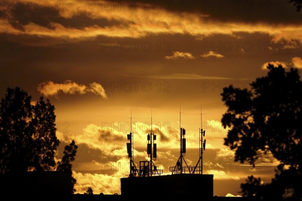 Radio masts, evening sky, autumn, Germany