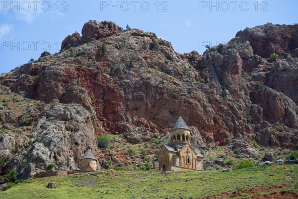 Lonely church in impressive rocky landscape under clear sky, Noravank monastery, Surb Astvatsatsin mausoleum church and Surb Karapet baptism church, Noravank, Vayots Dzor province, Wajoz Dzor, Armenia, Caucasus
