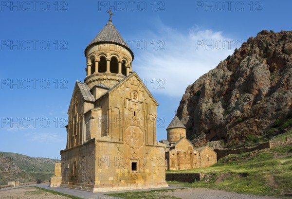 Stone church with dome in impressive mountain landscape, Noravank monastery, Surb Astvatsatsin mausoleum church and Surb Karapet baptism church, Noravank, Vayots Dzor province, Wajoz Dzor, Armenia, Caucasus