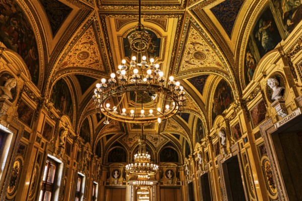 Sumptuous room and chandelier in the Vienna State Opera, Vienna, Austria