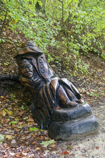 Wooden sculpture Der Haule, Pfullinger Sagenweg, stories and legends, by woodsaw artist Billy Tröge, Ursulaberg, Pfullingen, Baden-Württemberg, Germany