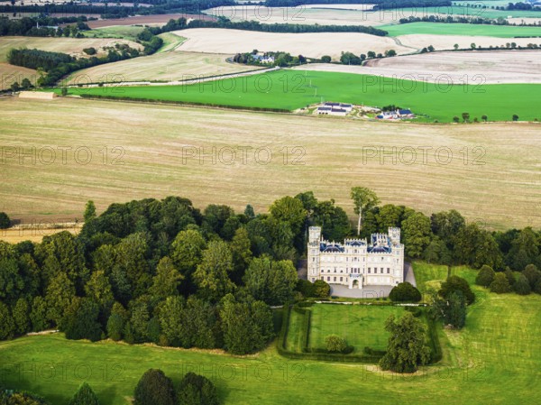 Wedderburn Castle and Barns over fields from a drone, Duns, Berwickshire, Scotland, UK