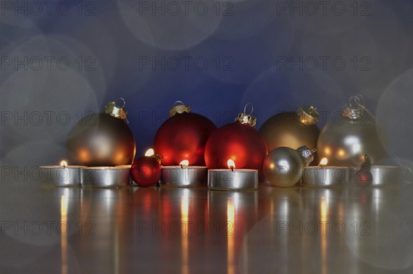 Still life with Christmas tree balls and candles, Germany