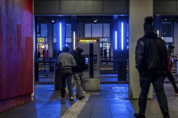 Underpass at Essen Central Station, away from the platforms to the public transport buses below the tracks, dark even on bright days, North Rhine-Westphalia, Germany
