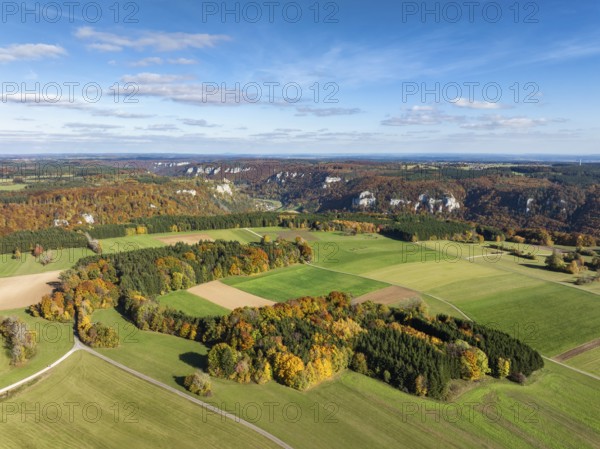 Aerial view of Upper Danube Valley surrounded by autumn vegetation, on the horizon Werenwag Castle, Sigmaringen district, Baden-Württemberg, Germany