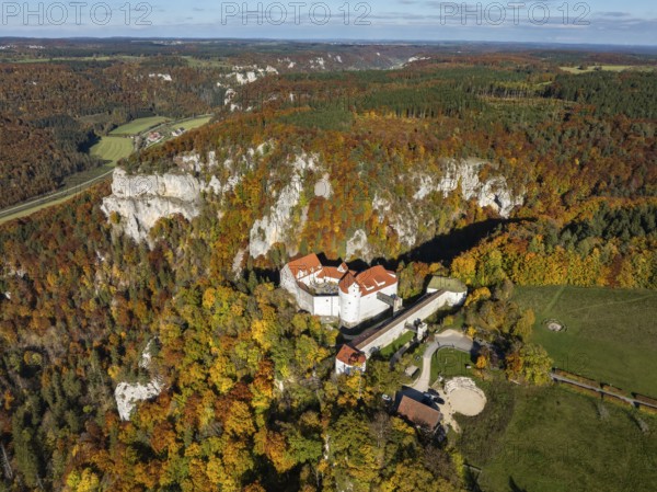 Aerial view of Wildenstein Castle near Leibertingen, surrounded by autumn vegetation, Upper Danube Valley, Sigmaringen district, Baden-Württemberg, Germany