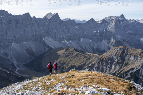 Two hikers on hiking trail, hiking to Gamsjoch, eastern Karwendel, Tyrol, Austria