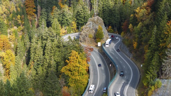 Kreuzfelsenkurve, Bundesstraße 31. The most spectacular curve in the Black Forest in autumn. Drone photo. Breitnau, Baden-Württemberg, Germany