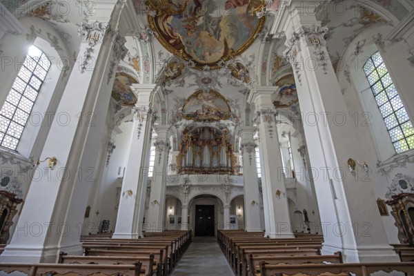 St. George and James Catholic Church, interior view, nave with ceiling frescoes and organ, Isny, Allgäu, Baden-Württemberg, Germany