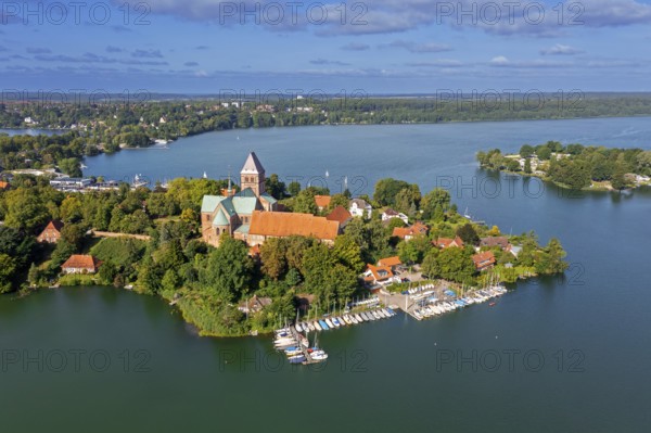 Aerial view over Ratzeburger Dom, late Brick Romanesque cathedral in the town Ratzeburg and the Ratzeburger See in summer, Schleswig-Holstein, Germany