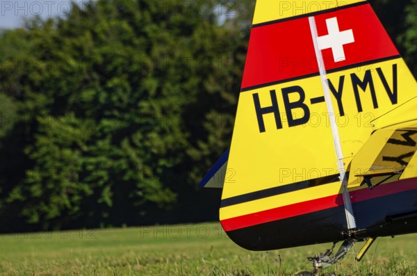 A Votec 351 sport aircraft from Swiss MSW Aviation AG with registration HB-YMV during a flight demonstration as part of an air show on Rossfeld in Metzingen-Glems, Baden-Württemberg, Germany, for editorial use only, digitally reworked