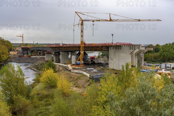 Four-lane new building of the town bypass in Wesel, B58n, here the bridge structure across the Lippe estuary into the Rhine, so far traffic flows through the town towards the Rhine bridge Wesel westwards, or vice versa, over 23, 000 vehicles use this route, after completion, traffic then runs between A3 in the east and A57 around the town, Wesel North Rhine-Westphalia