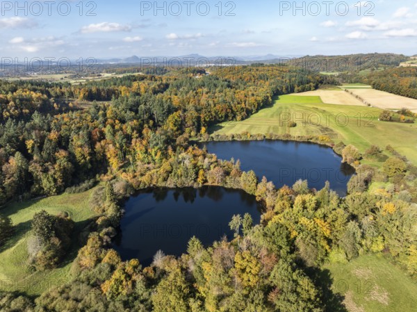 Aerial view of Lake Beech including Güttinger See, a swimming lake near Radolfzell am Lake Constance, on the horizon the Hegauberge Mountains, district of Constance, Baden-Württemberg, Germany