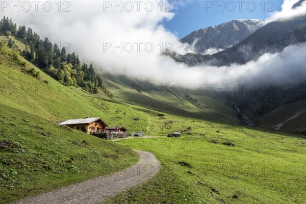 Dietersbachtal valley closure, left Alpe Dietersbach, Nebelschwanden hanging in the valley, mountains of the Allgäu Alps behind, Oberstdorf, Oberallgäu, Allgäu, Bavaria, Germany