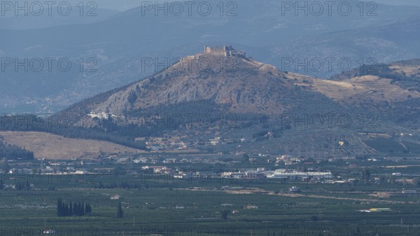 View of a fortress located on a hill, view of the plain, archaeological site, UNESCO World Heritage Site, Mycenae, Mycenae, important city in pre-classical times, Peloponnese, peninsula, Greece