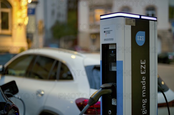 Parking lot with gas pump, EZE Network charging station, SICHARGE model for electric cars, charging station, e-mobility, e-car, pictogram, logo, Stuttgart, Baden-Württemberg, Germany
