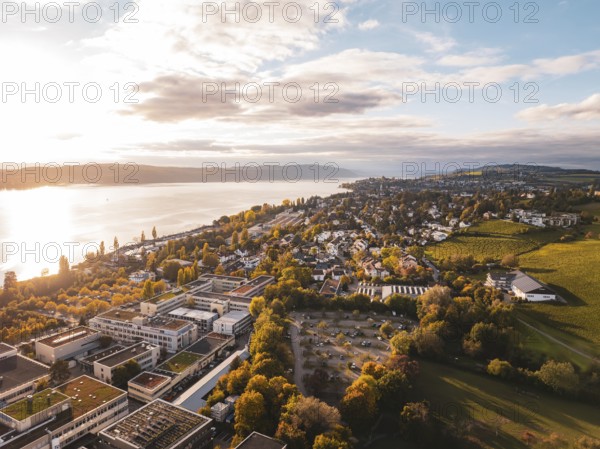 A view of the city from above with a lake in the background and autumn landscape, Überlingen, Lake Constance, Germany