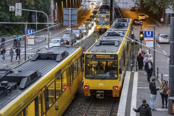 Wilhelmsplatz Bad Cannstatt stop, Stuttgarter Strassenbahnen AG, SSB. Platform with passengers. Stuttgart, Baden-Württemberg, Germany