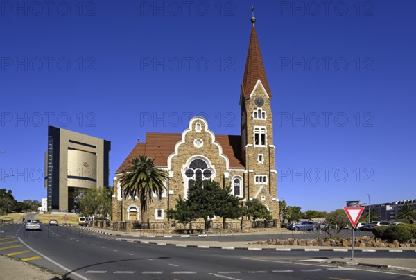 Evangelical Lutheran Christ Church from 1910, in the background the Independence Museum, Windhoek, Khomas region, Namibia