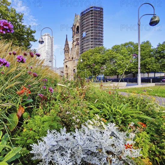 Planted middle strip of Tauentzienstraße with Kaiser Wilhelm Memorial Church, promenade, Charlottenburg, Berlin, Germany