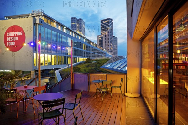 Bikini Berlin with the Upper West Tower in the background in the evening, Charlottenburg, Berlin, Germany