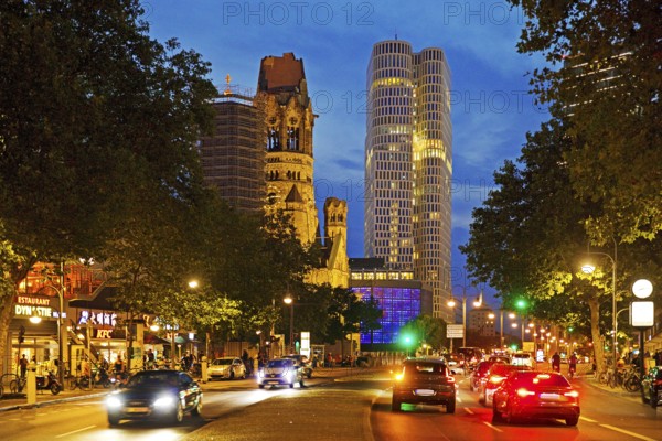 Budapester Straße with Kaiser Wilhelm Memorial Church and Upper West Tower in the evening, Charlottenburg, Berlin, Germany