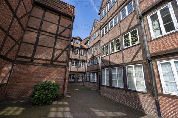 Facades of the historic brick buildings, inner courtyard, view over the city, Peterstraße, composers' quarter, Neustadt, Hamburg, Germany