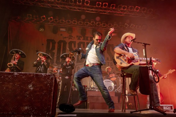 Alec Völkel (Boss Burns) and Sascha Vollmer (Hoss Power), singer of the band The BossHoss on their Back To The Boots Tour 2025 at Capitol Hannover on 3 October 2025