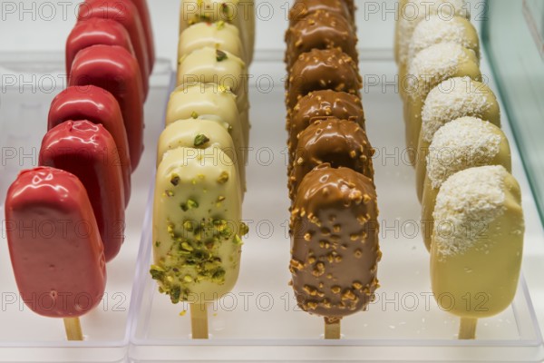 Ice lollies in a patisserie display