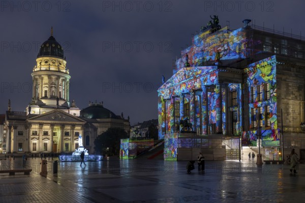 Concert hall Berlin, Gendarmenmarkt, art action The Hands of Berlin, . BERLIN FESTIVAL OF LIGHTS, motto Let's Shine Together, light installations, 8 October 2025, Berlin, Germany, opening day in drizzle < english> 21st BERLIN FESTIVAL OF LIGHTS, motto Let's Shine Together, light installations, October 8, 2025, Berlin, Germany