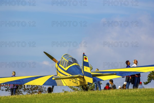 A Moravan Zlin Z126 multi-purpose aircraft parked at the edge of the airfield during an air show at Rossfeld in Metzingen-Glems, Baden-Württemberg, Germany, for editorial use only