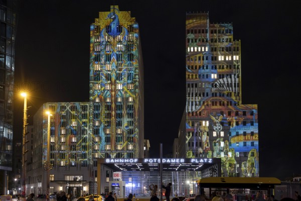 The Ritz-Carlton Hotel, Potsdamer Platz, 21st BERLIN FESTIVAL OF LIGHTS, motto Let's Shine Together, light installations, 8 October 2025, Berlin, Germany, opening day in drizzle < english> 21st BERLIN FESTIVAL OF LIGHTS, motto Let's Shine Together, light installations, October 8, 2025, Berlin, Germany