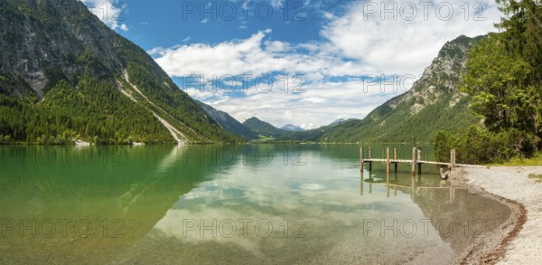 Jetty on Lake Heiterwanger See in the Ammergau Alps, Heiterwang near Reutte, Tyrol, Austria