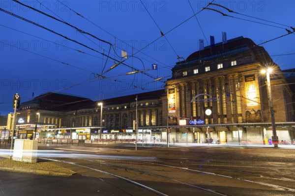 Street and tram tracks in front of the main station, tracers, blue hour, main station, Leipzig, Saxony, Germany