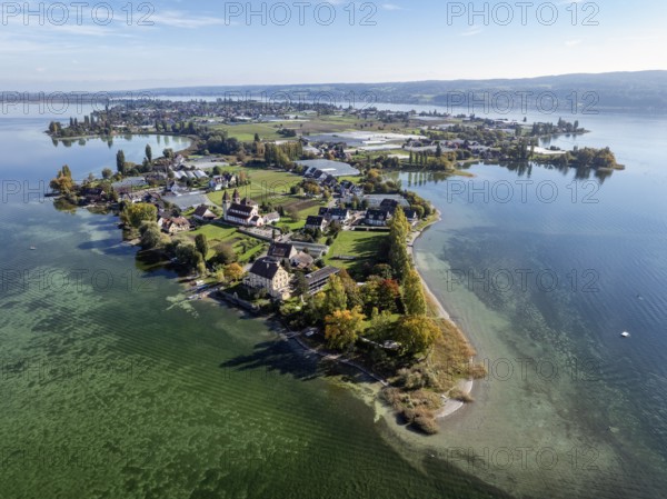 Aerial view of the north-western tip of the island of Reichenau in Lake Constance, with the district of Niederzell and the columned basilica of St Peter and Paul, Windegg Castle on the shore, district of Constance, Baden-Württemberg, Germany